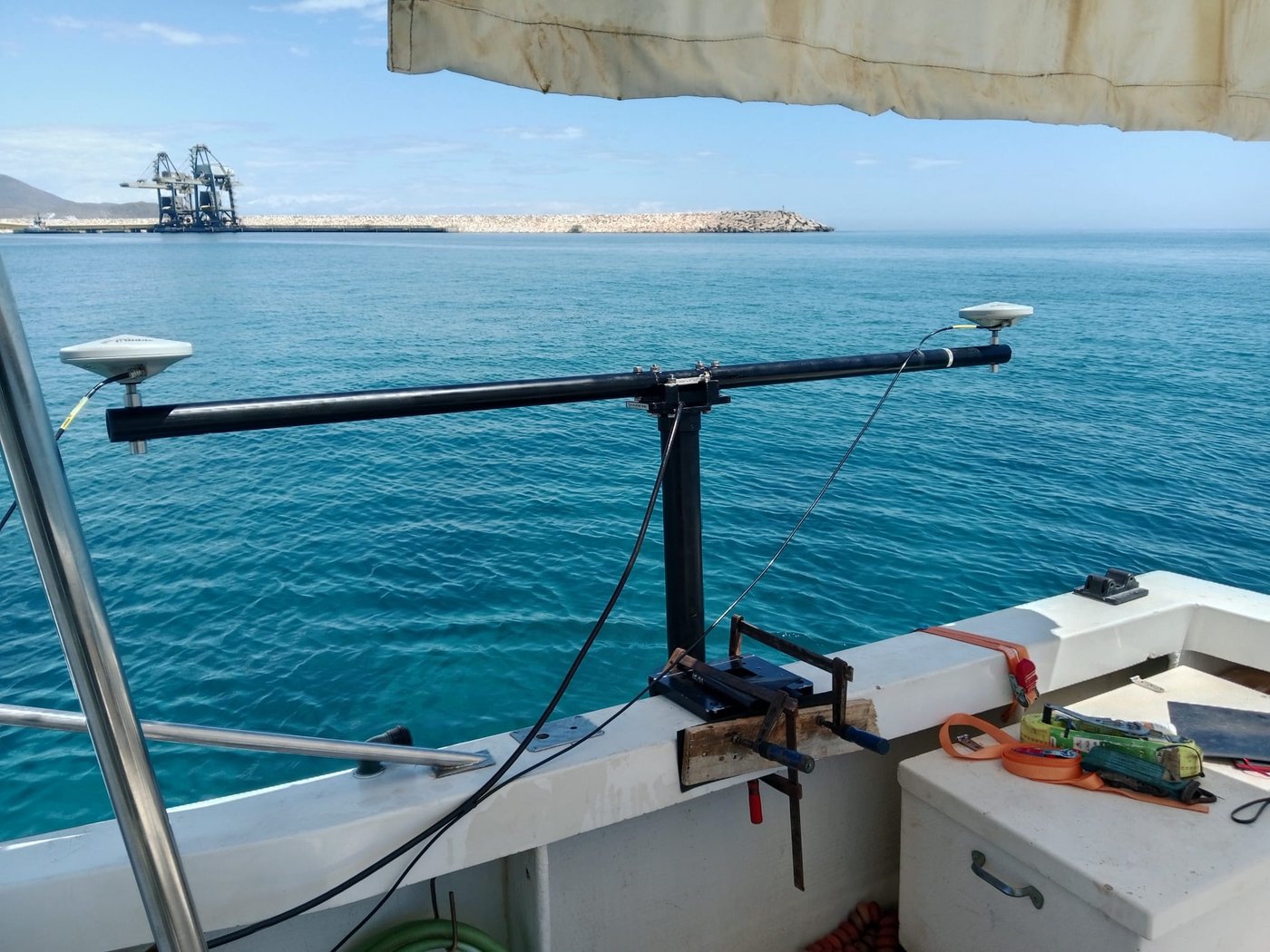 GNSS positioning antennas on board, with the port in the background