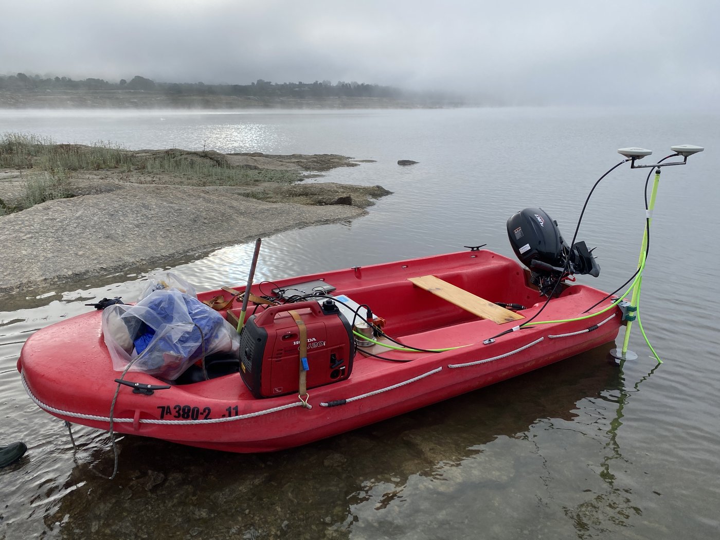 Survey boat with a multibeam echosounder at the Tabuaço reservoir